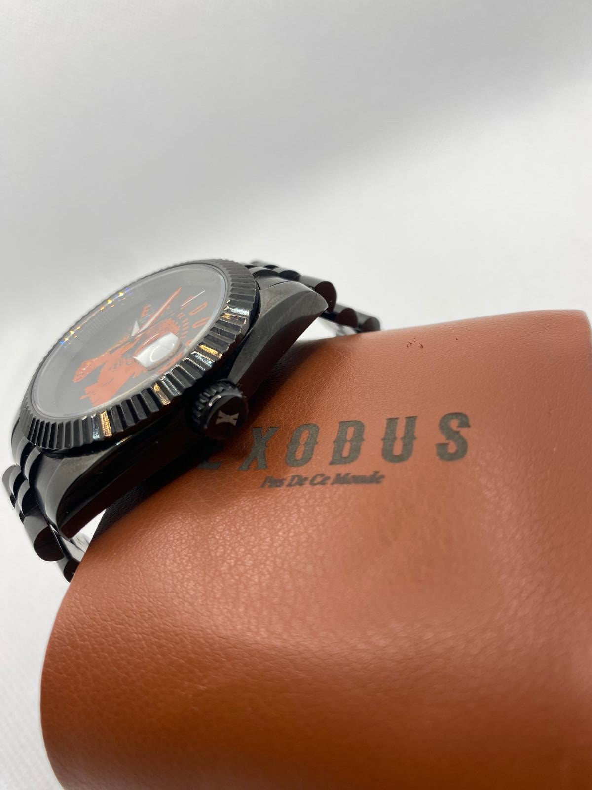 Clothing and accessories from Exodus Pas De Ce Monde – unisex streetwear including t-shirts, jackets, sunglasses, jewelry, bags, and headwear designed for everyday wear and bold urban fashion.