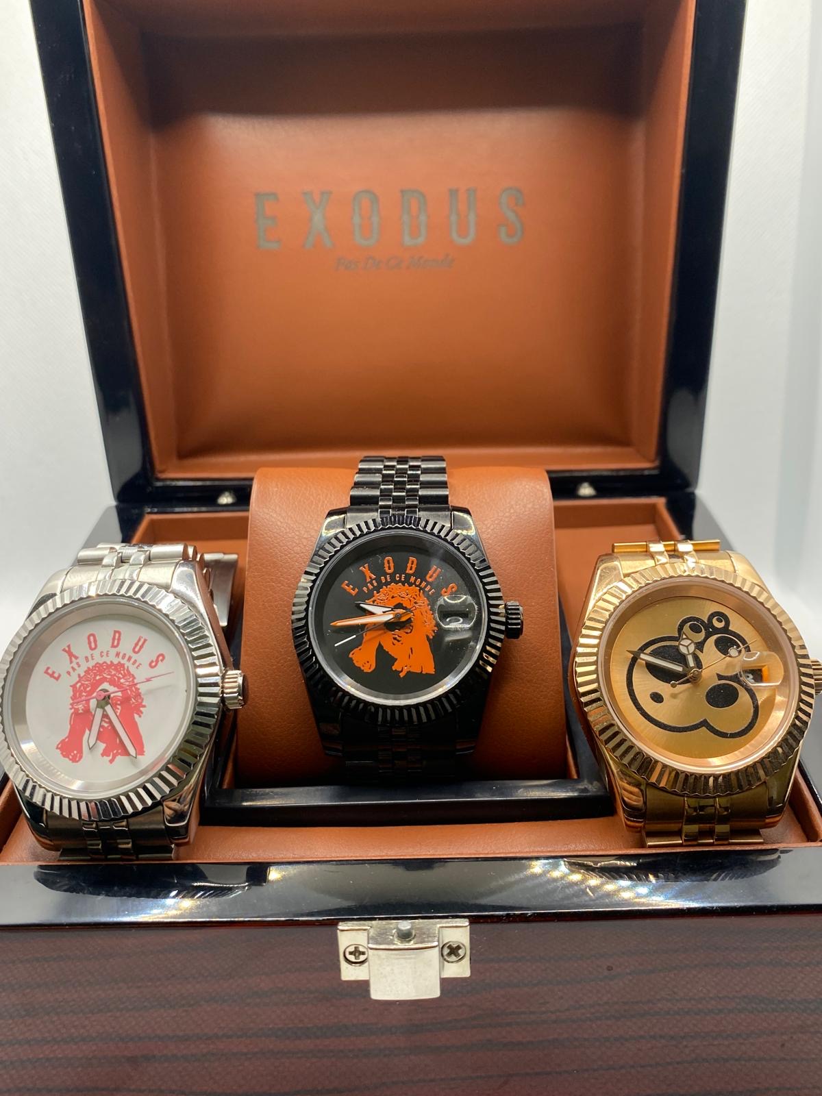 Clothing and accessories from Exodus Pas De Ce Monde – unisex streetwear including t-shirts, jackets, sunglasses, jewelry, bags, and headwear designed for everyday wear and bold urban fashion.