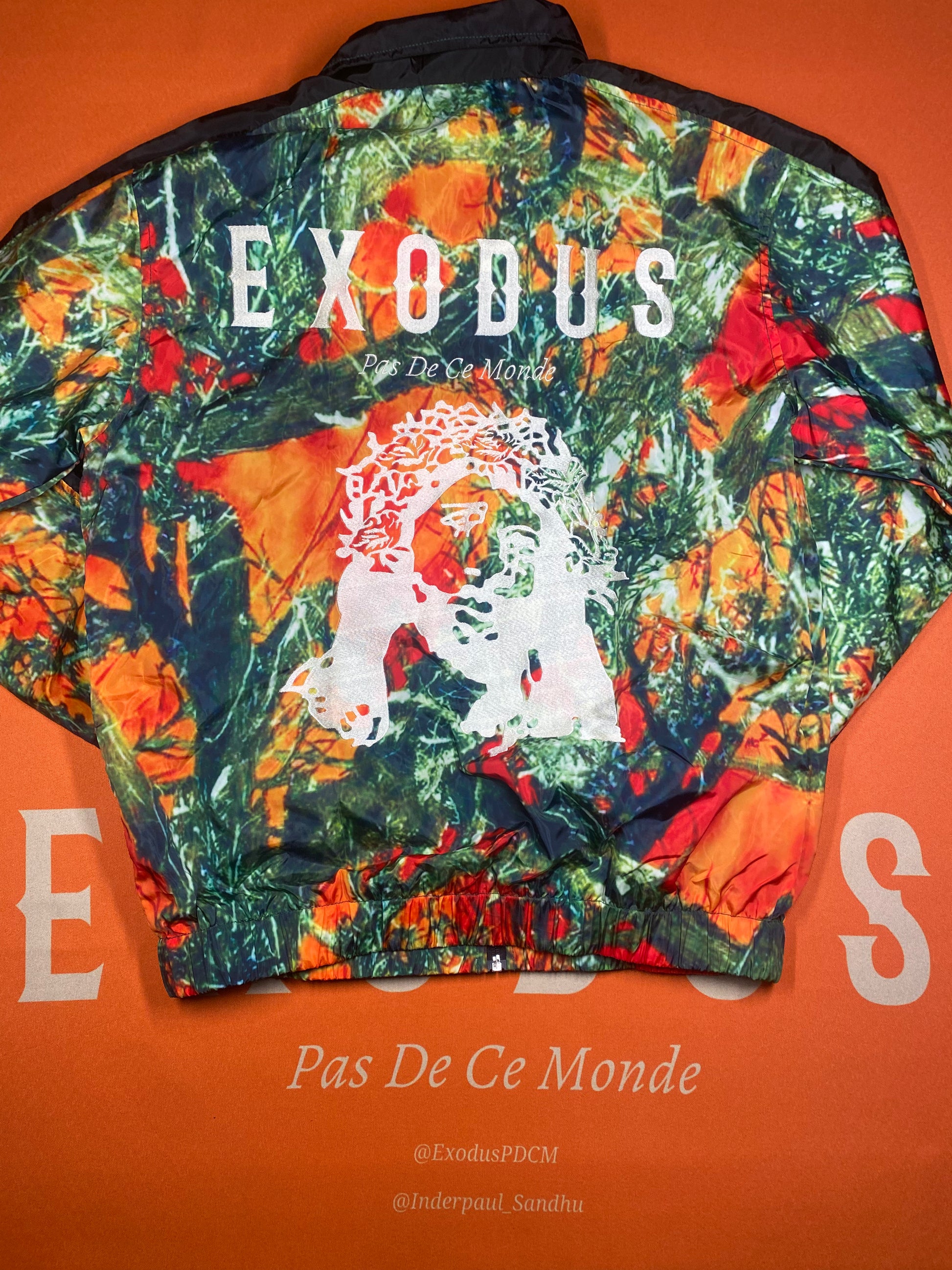 Clothing and accessories from Exodus Pas De Ce Monde – unisex streetwear including t-shirts, jackets, sunglasses, jewelry, bags, and headwear designed for everyday wear and bold urban fashion.