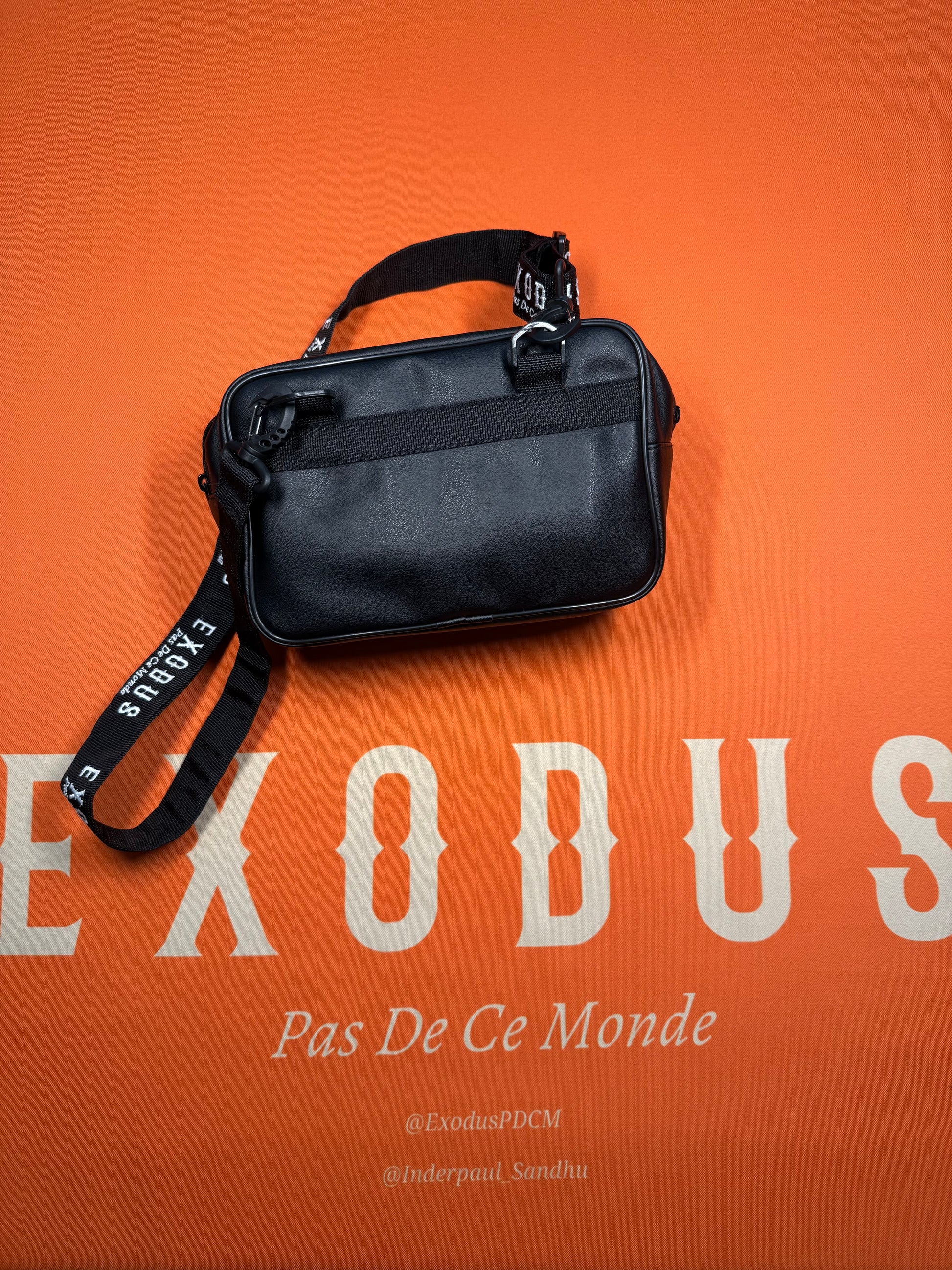Clothing and accessories from Exodus Pas De Ce Monde – unisex streetwear including t-shirts, jackets, sunglasses, jewelry, bags, and headwear designed for everyday wear and bold urban fashion.
