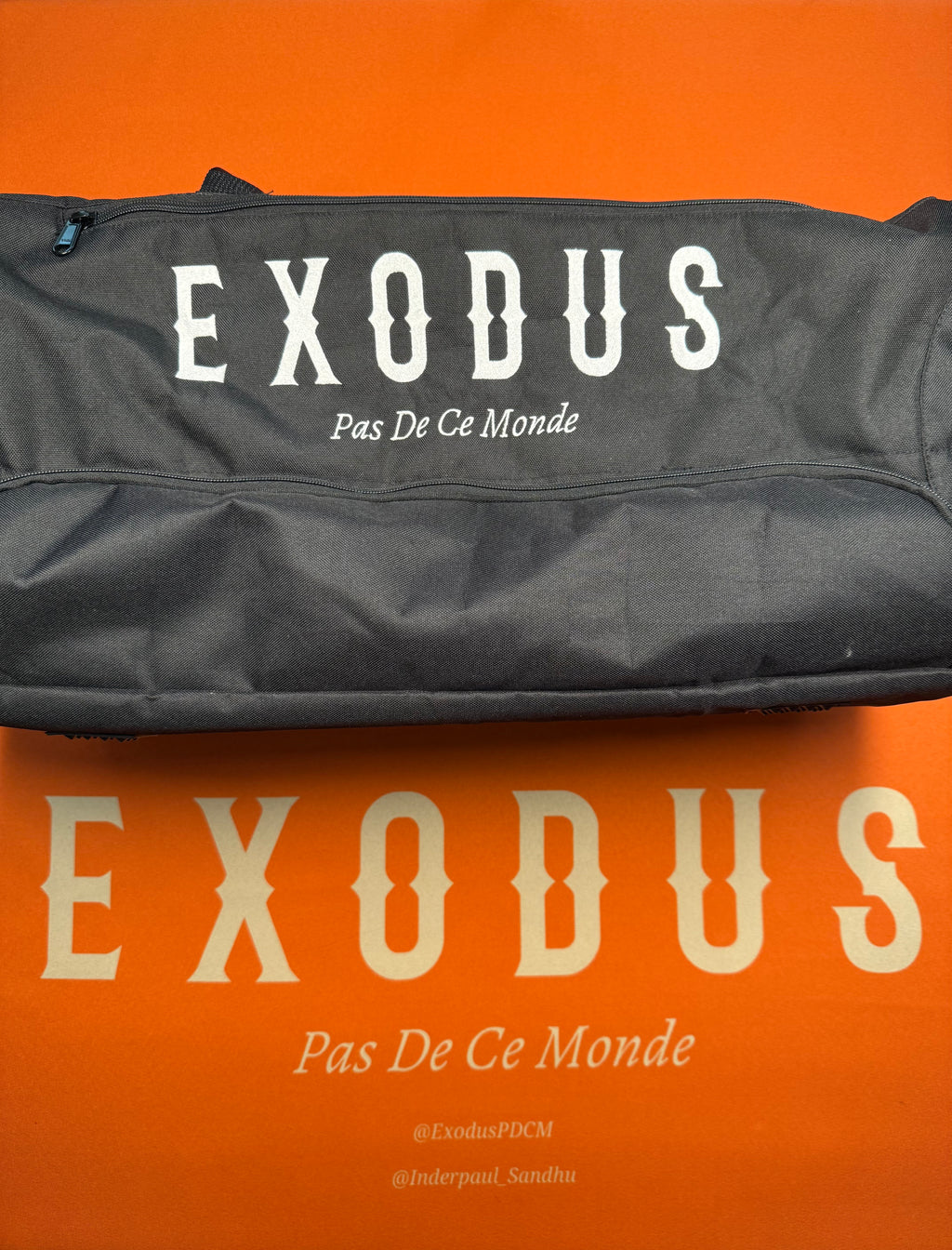 Clothing and accessories from Exodus Pas De Ce Monde – unisex streetwear including t-shirts, jackets, sunglasses, jewelry, bags, and headwear designed for everyday wear and bold urban fashion.
