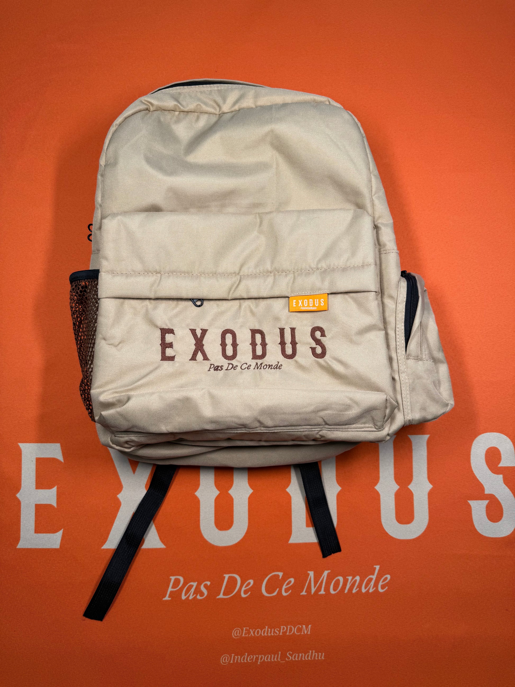 Clothing and accessories from Exodus Pas De Ce Monde – unisex streetwear including t-shirts, jackets, sunglasses, jewelry, bags, and headwear designed for everyday wear and bold urban fashion.