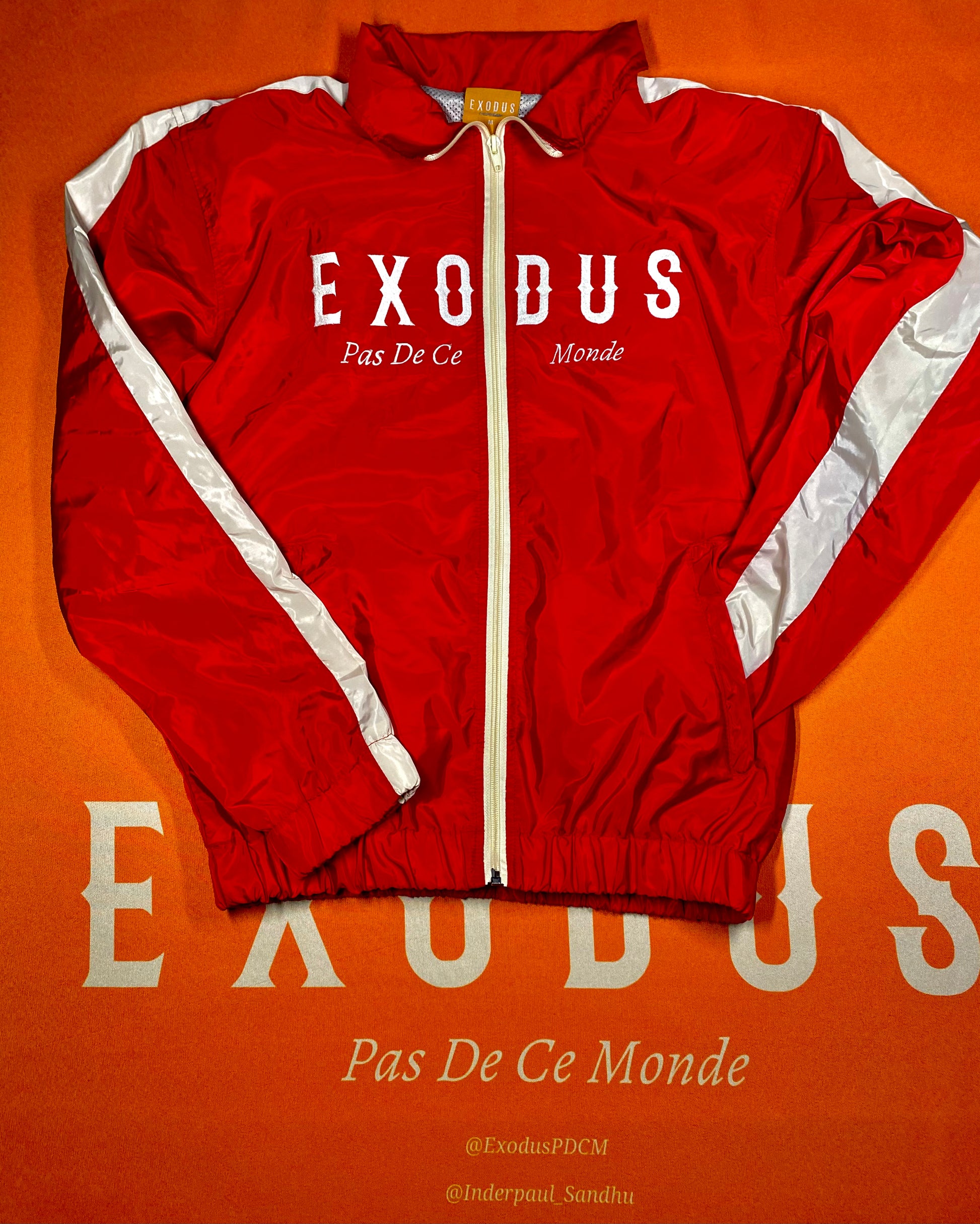 Clothing and accessories from Exodus Pas De Ce Monde – unisex streetwear including t-shirts, jackets, sunglasses, jewelry, bags, and headwear designed for everyday wear and bold urban fashion.