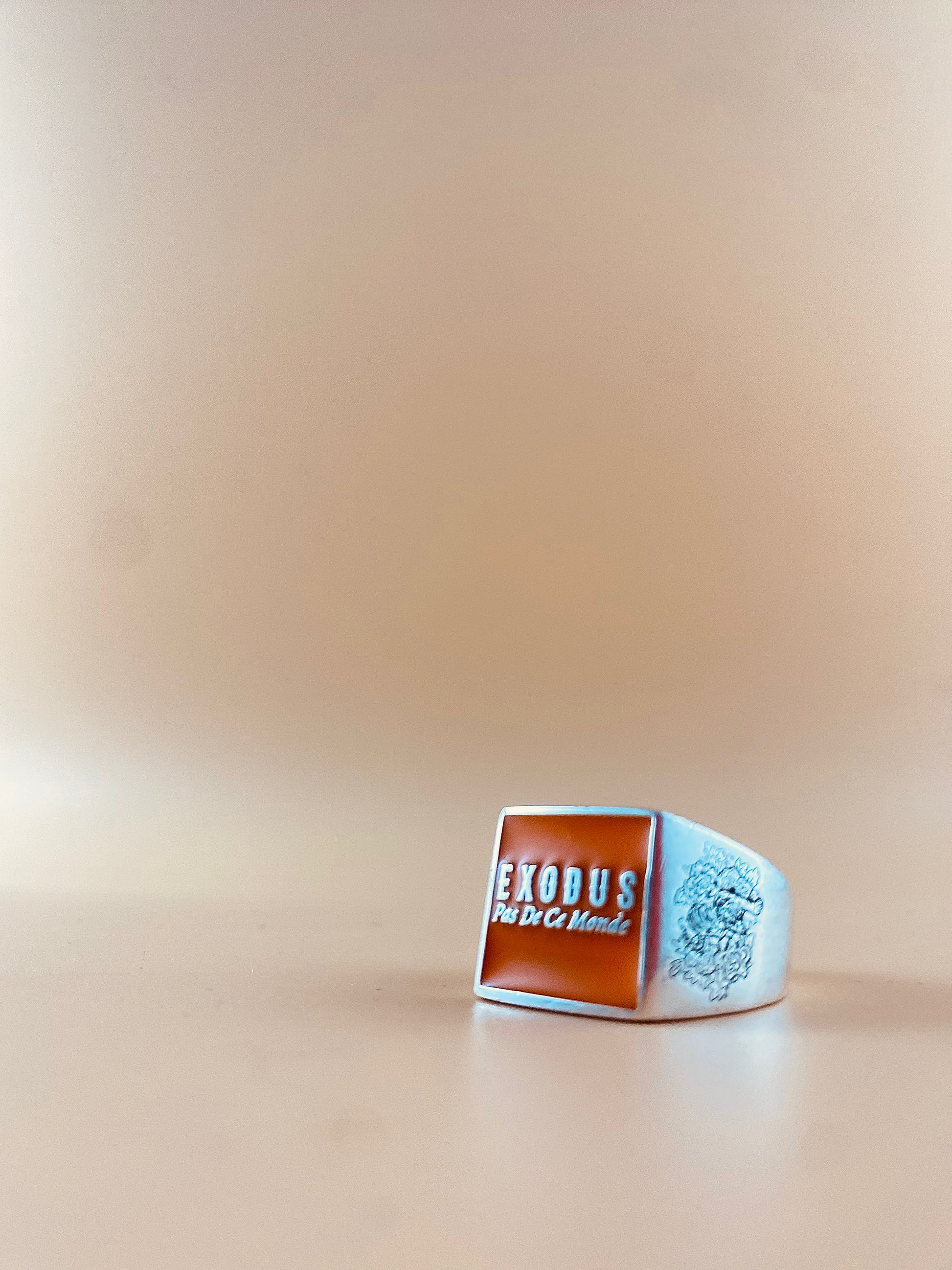 Clothing and accessories from Exodus Pas De Ce Monde – unisex streetwear including t-shirts, jackets, sunglasses, jewelry, bags, and headwear designed for everyday wear and bold urban fashion.