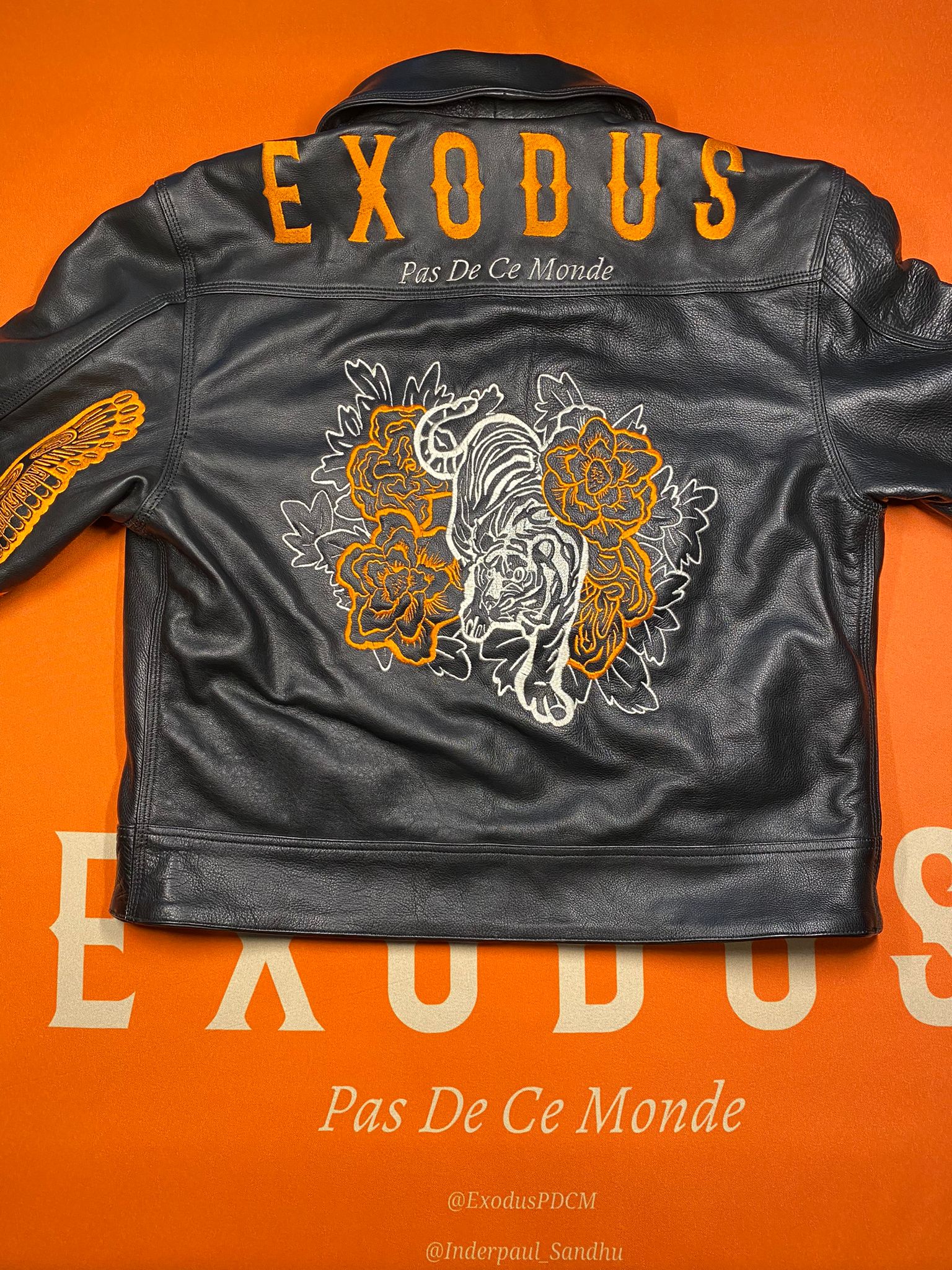 Clothing and accessories from Exodus Pas De Ce Monde – unisex streetwear including t-shirts, jackets, sunglasses, jewelry, bags, and headwear designed for everyday wear and bold urban fashion.
