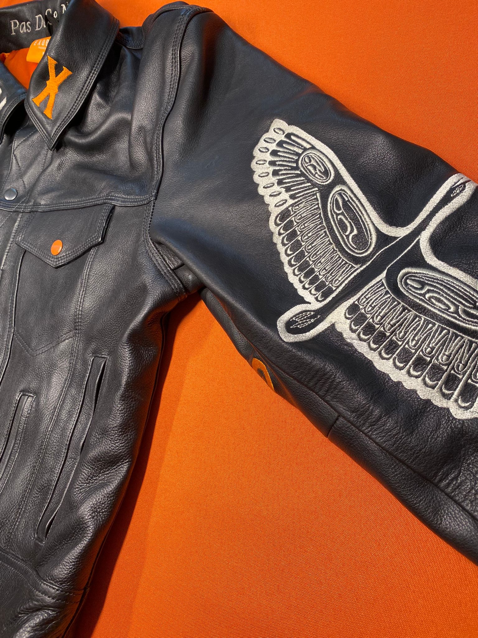 Clothing and accessories from Exodus Pas De Ce Monde – unisex streetwear including t-shirts, jackets, sunglasses, jewelry, bags, and headwear designed for everyday wear and bold urban fashion.