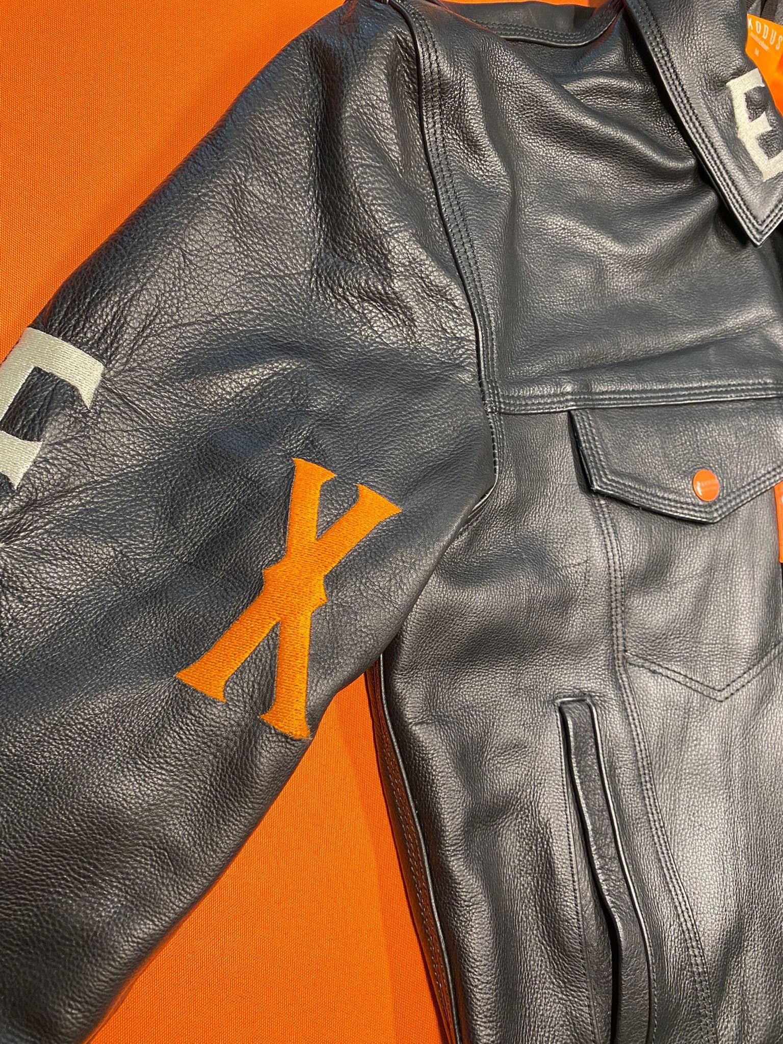 Clothing and accessories from Exodus Pas De Ce Monde – unisex streetwear including t-shirts, jackets, sunglasses, jewelry, bags, and headwear designed for everyday wear and bold urban fashion.