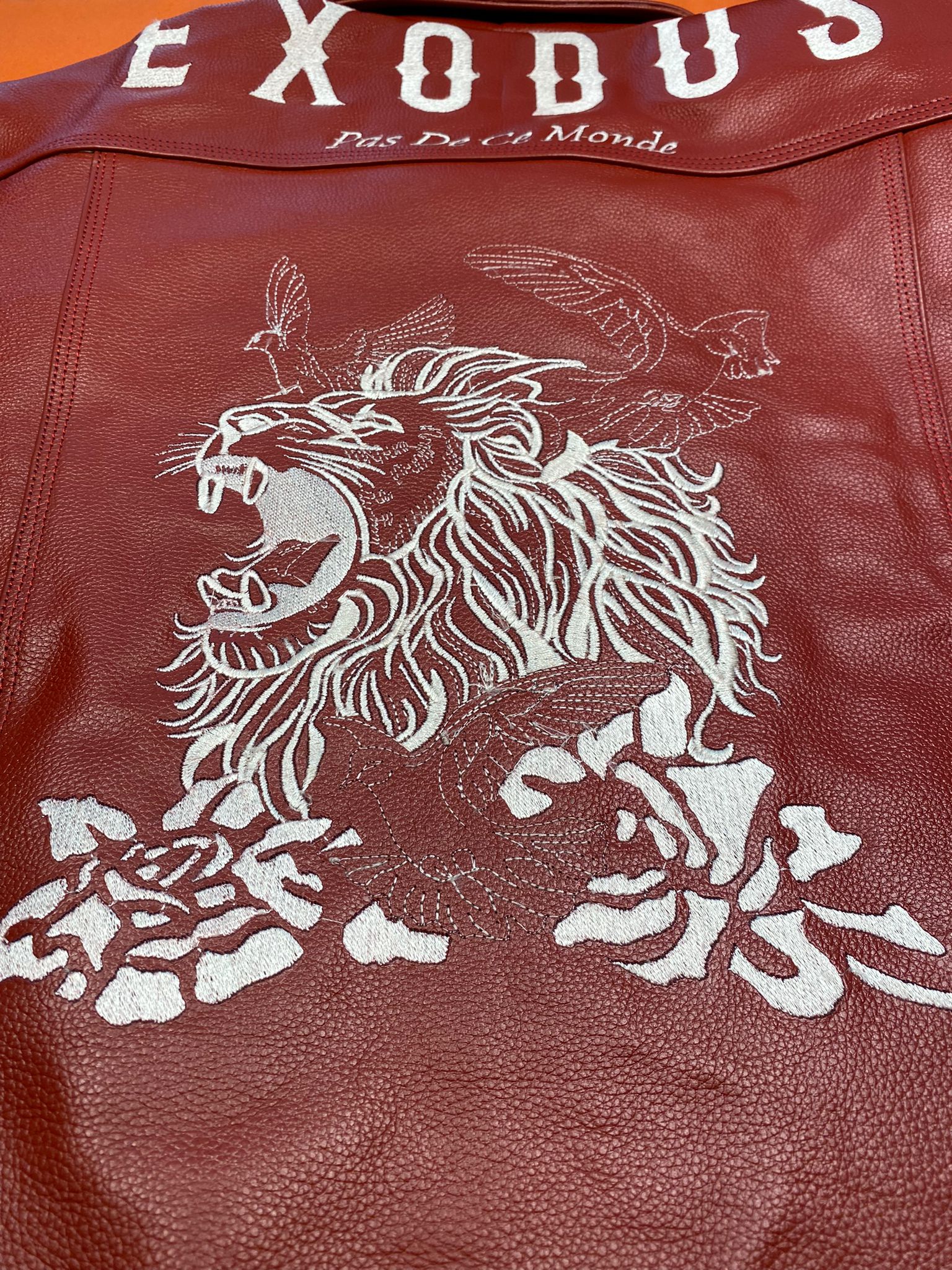 Clothing and accessories from Exodus Pas De Ce Monde – unisex streetwear including t-shirts, jackets, sunglasses, jewelry, bags, and headwear designed for everyday wear and bold urban fashion.