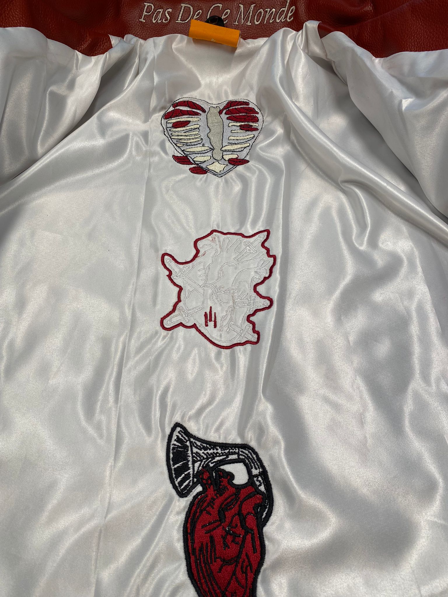 Clothing and accessories from Exodus Pas De Ce Monde – unisex streetwear including t-shirts, jackets, sunglasses, jewelry, bags, and headwear designed for everyday wear and bold urban fashion.