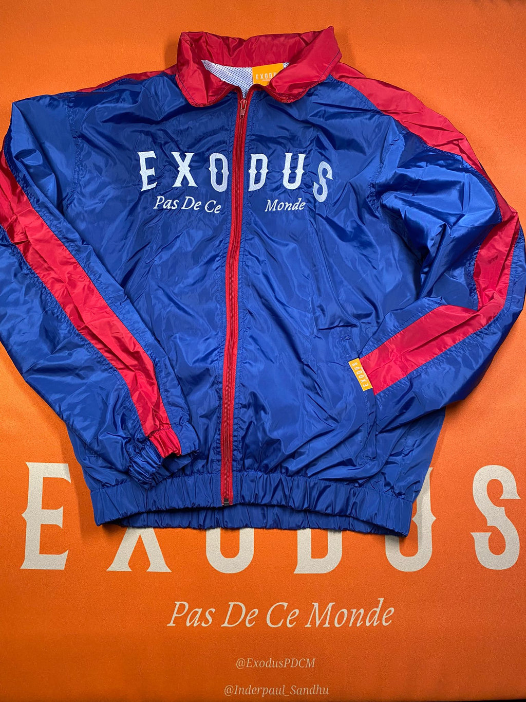 Clothing and accessories from Exodus Pas De Ce Monde – unisex streetwear including t-shirts, jackets, sunglasses, jewelry, bags, and headwear designed for everyday wear and bold urban fashion.