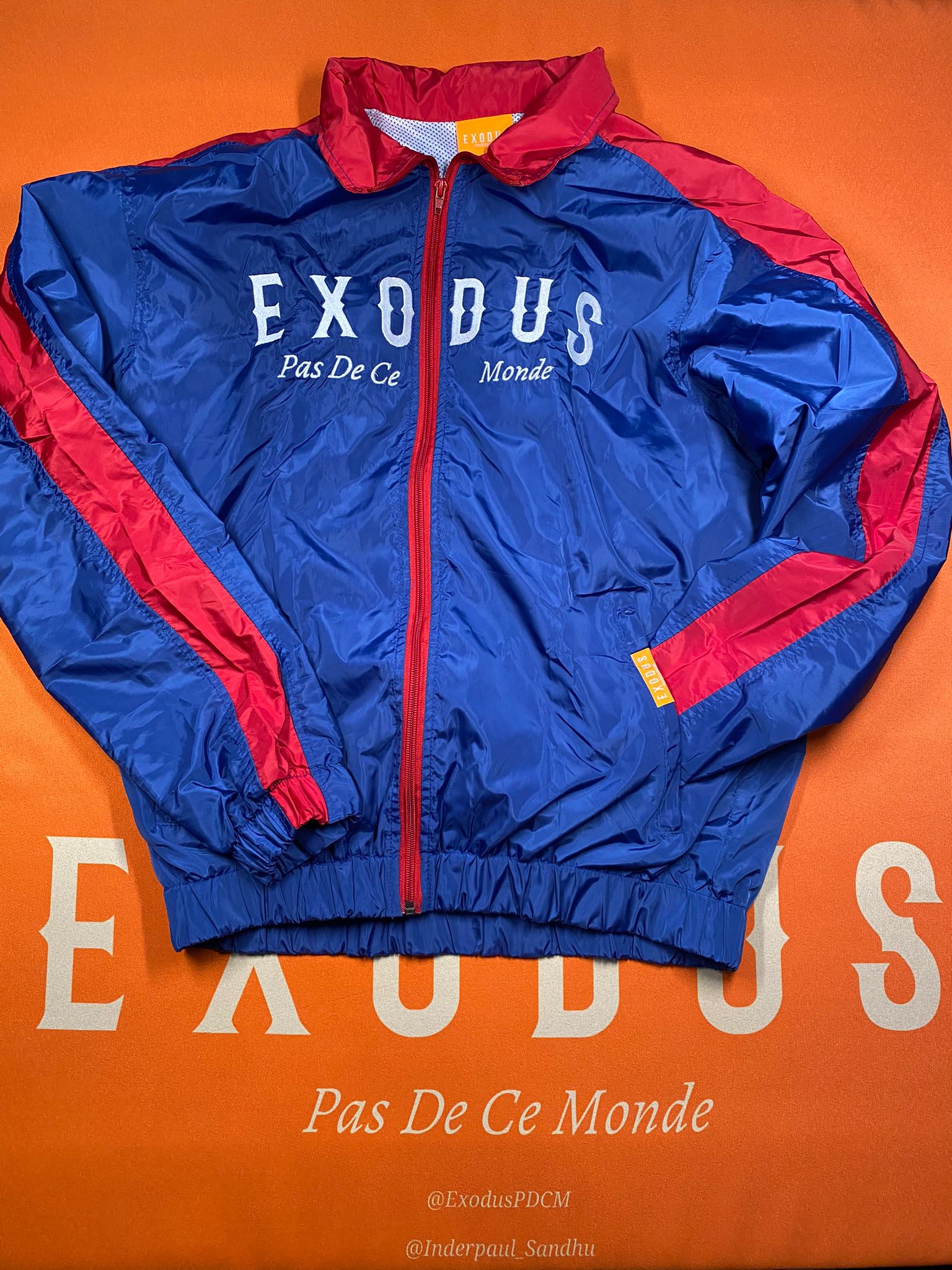 Clothing and accessories from Exodus Pas De Ce Monde – unisex streetwear including t-shirts, jackets, sunglasses, jewelry, bags, and headwear designed for everyday wear and bold urban fashion.
