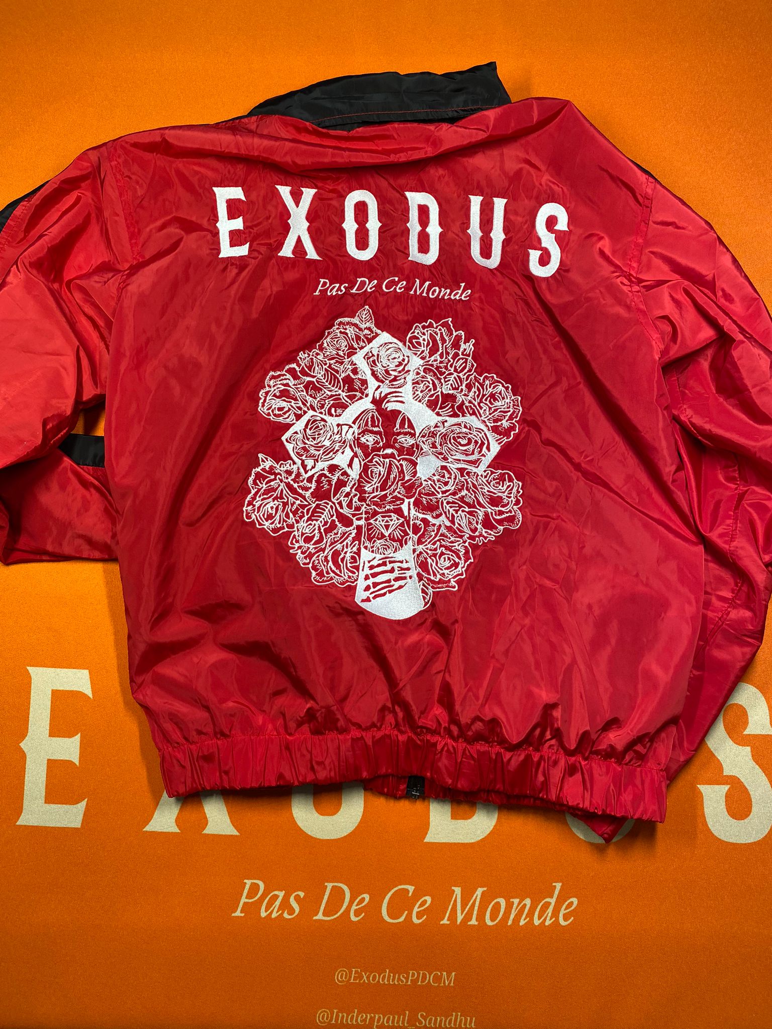 Clothing and accessories from Exodus Pas De Ce Monde – unisex streetwear including t-shirts, jackets, sunglasses, jewelry, bags, and headwear designed for everyday wear and bold urban fashion.