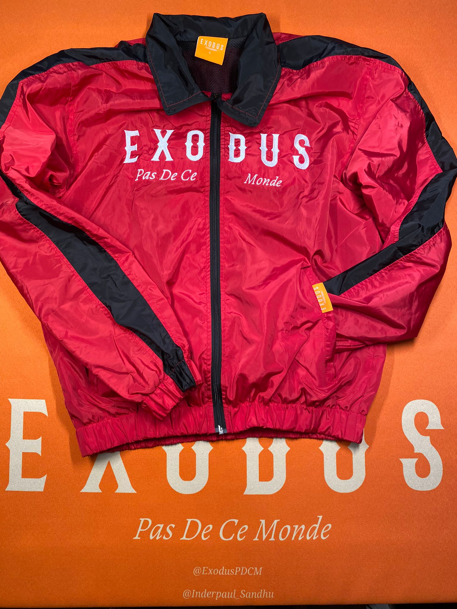 Clothing and accessories from Exodus Pas De Ce Monde – unisex streetwear including t-shirts, jackets, sunglasses, jewelry, bags, and headwear designed for everyday wear and bold urban fashion.