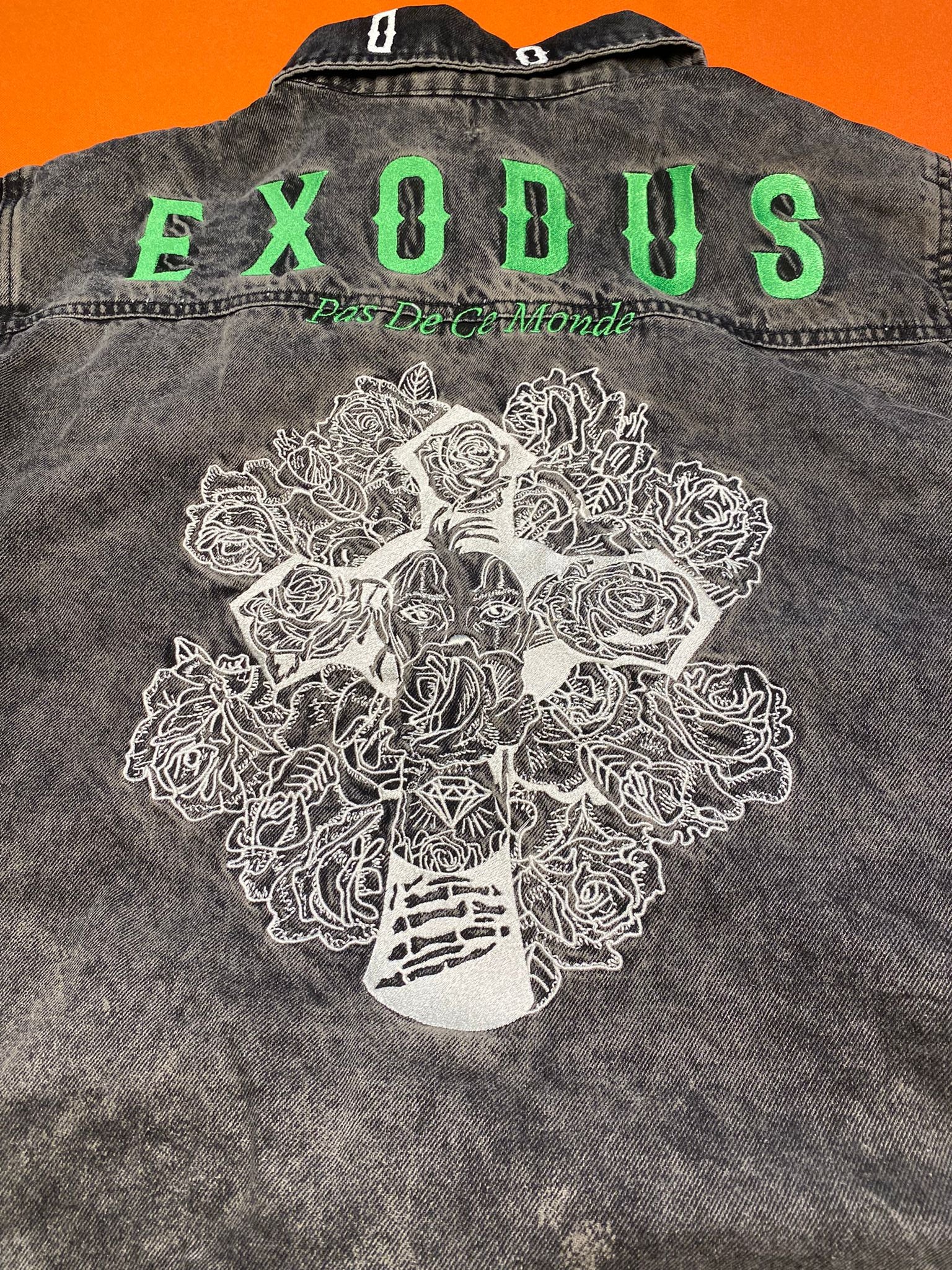 Clothing and accessories from Exodus Pas De Ce Monde – unisex streetwear including t-shirts, jackets, sunglasses, jewelry, bags, and headwear designed for everyday wear and bold urban fashion.
