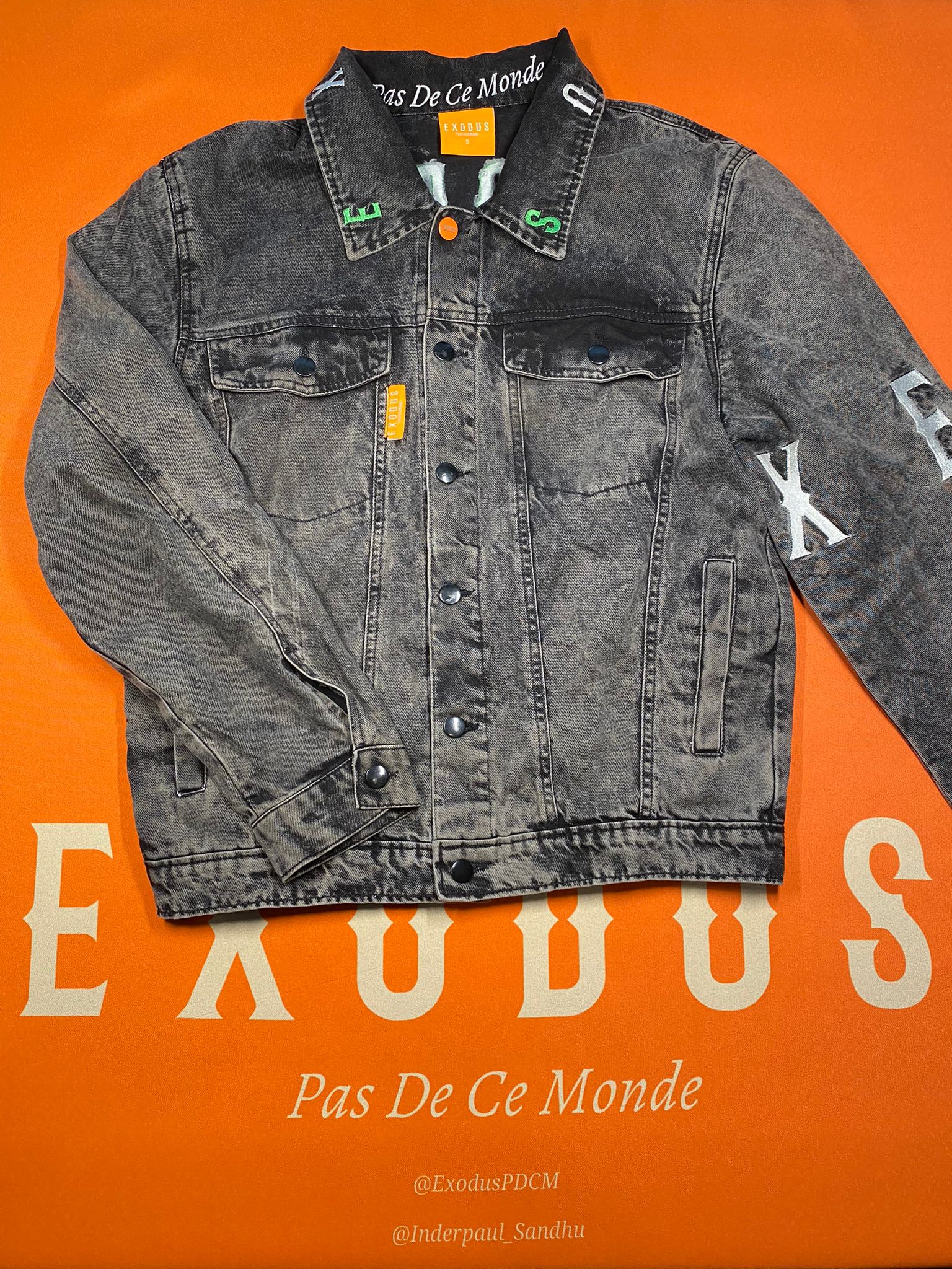 Clothing and accessories from Exodus Pas De Ce Monde – unisex streetwear including t-shirts, jackets, sunglasses, jewelry, bags, and headwear designed for everyday wear and bold urban fashion.
