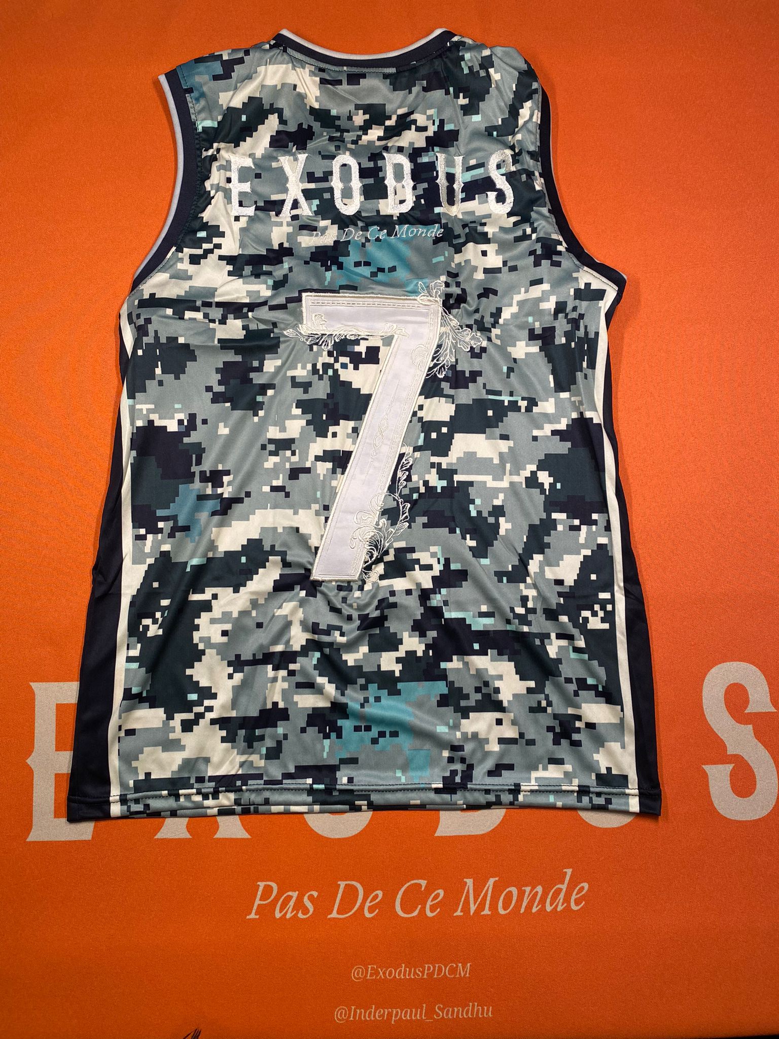 Clothing and accessories from Exodus Pas De Ce Monde – unisex streetwear including t-shirts, jackets, sunglasses, jewelry, bags, and headwear designed for everyday wear and bold urban fashion.