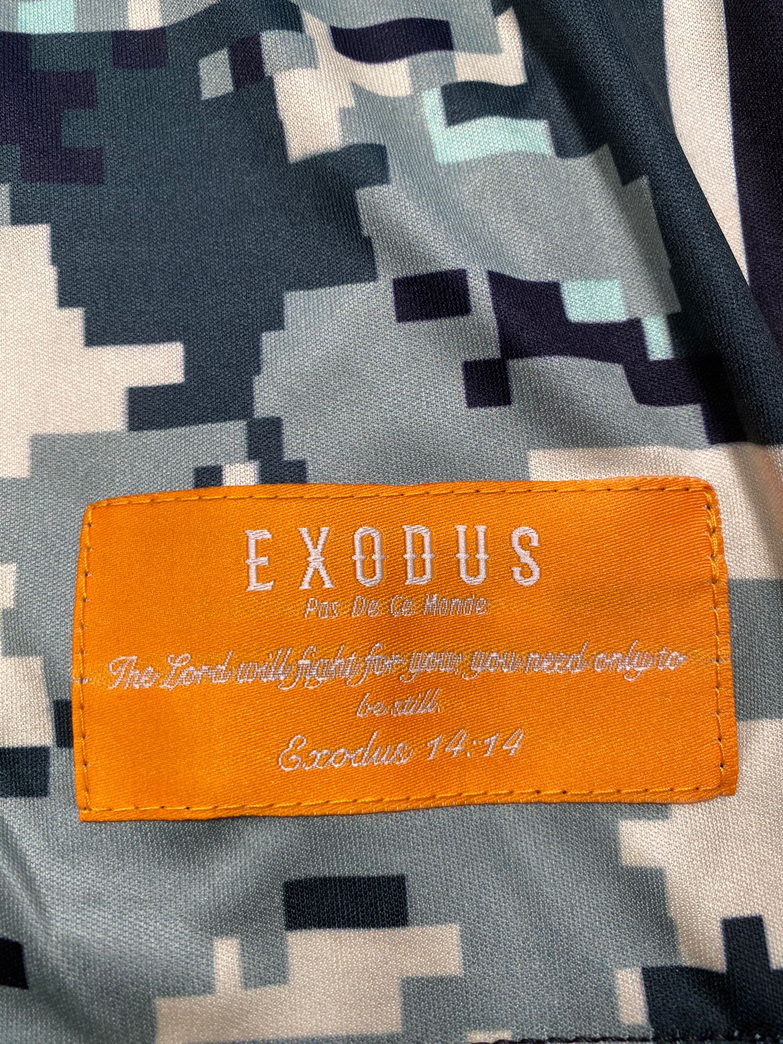 Clothing and accessories from Exodus Pas De Ce Monde – unisex streetwear including t-shirts, jackets, sunglasses, jewelry, bags, and headwear designed for everyday wear and bold urban fashion.