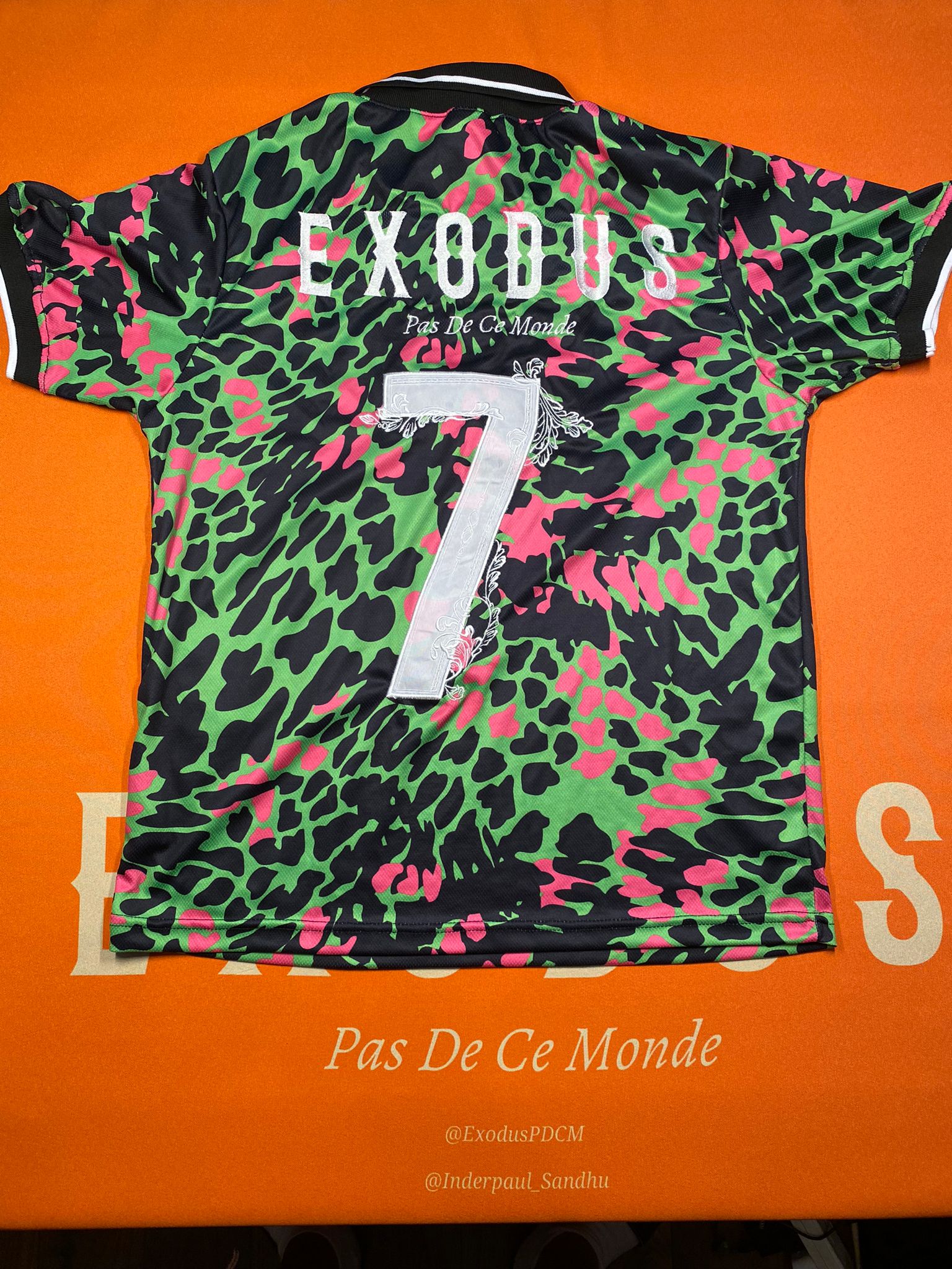 Clothing and accessories from Exodus Pas De Ce Monde – unisex streetwear including t-shirts, jackets, sunglasses, jewelry, bags, and headwear designed for everyday wear and bold urban fashion.