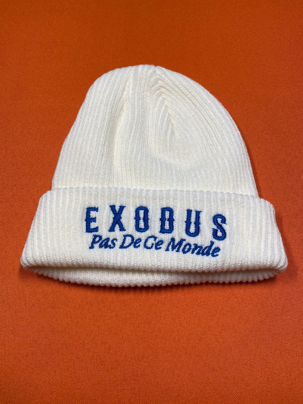 Clothing and accessories from Exodus Pas De Ce Monde – unisex streetwear including t-shirts, jackets, sunglasses, jewelry, bags, and headwear designed for everyday wear and bold urban fashion.