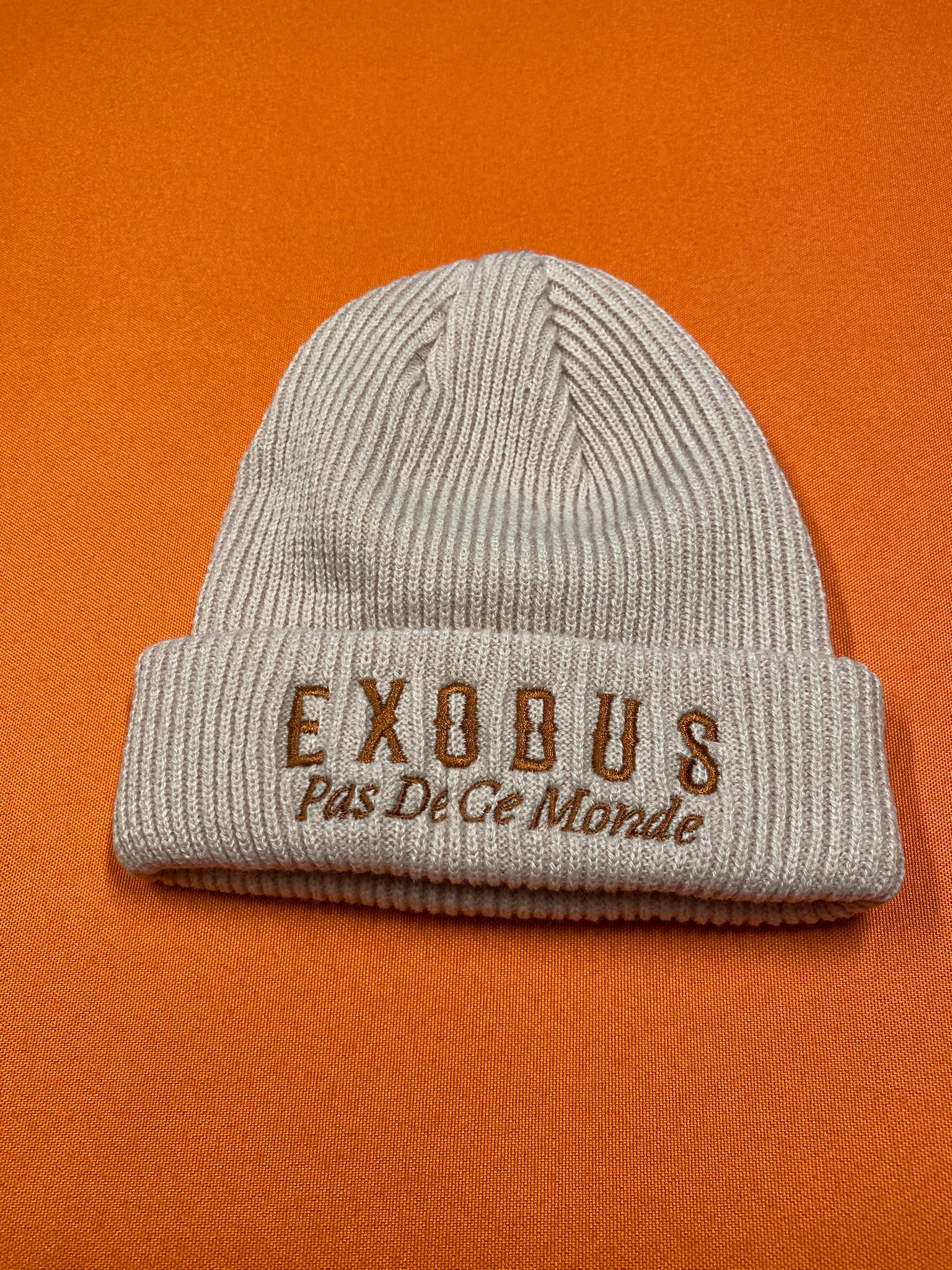 Clothing and accessories from Exodus Pas De Ce Monde – unisex streetwear including t-shirts, jackets, sunglasses, jewelry, bags, and headwear designed for everyday wear and bold urban fashion.