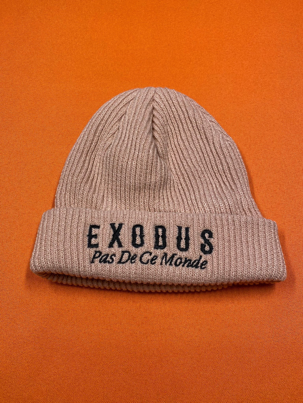 Clothing and accessories from Exodus Pas De Ce Monde – unisex streetwear including t-shirts, jackets, sunglasses, jewelry, bags, and headwear designed for everyday wear and bold urban fashion.