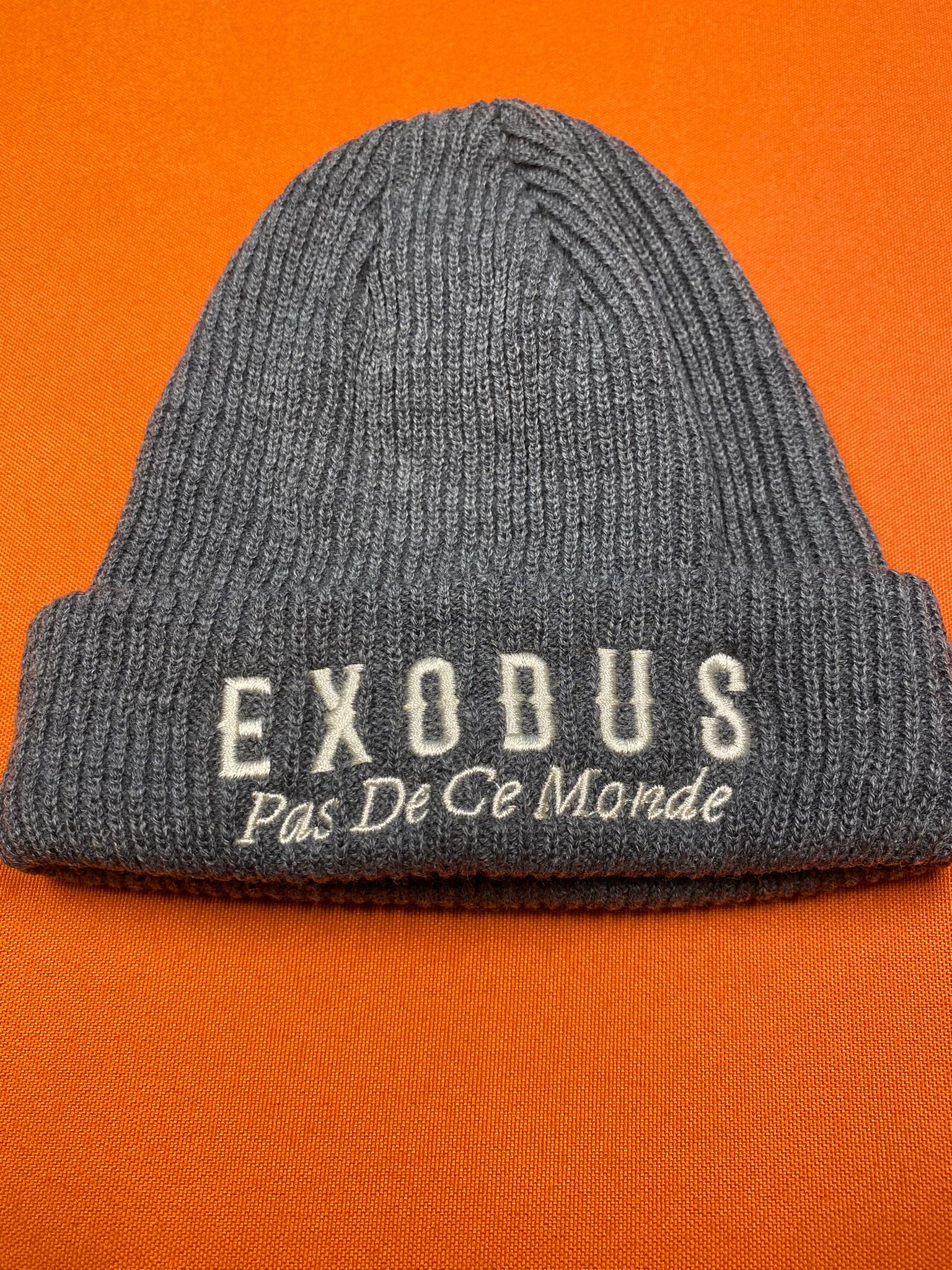 Clothing and accessories from Exodus Pas De Ce Monde – unisex streetwear including t-shirts, jackets, sunglasses, jewelry, bags, and headwear designed for everyday wear and bold urban fashion.