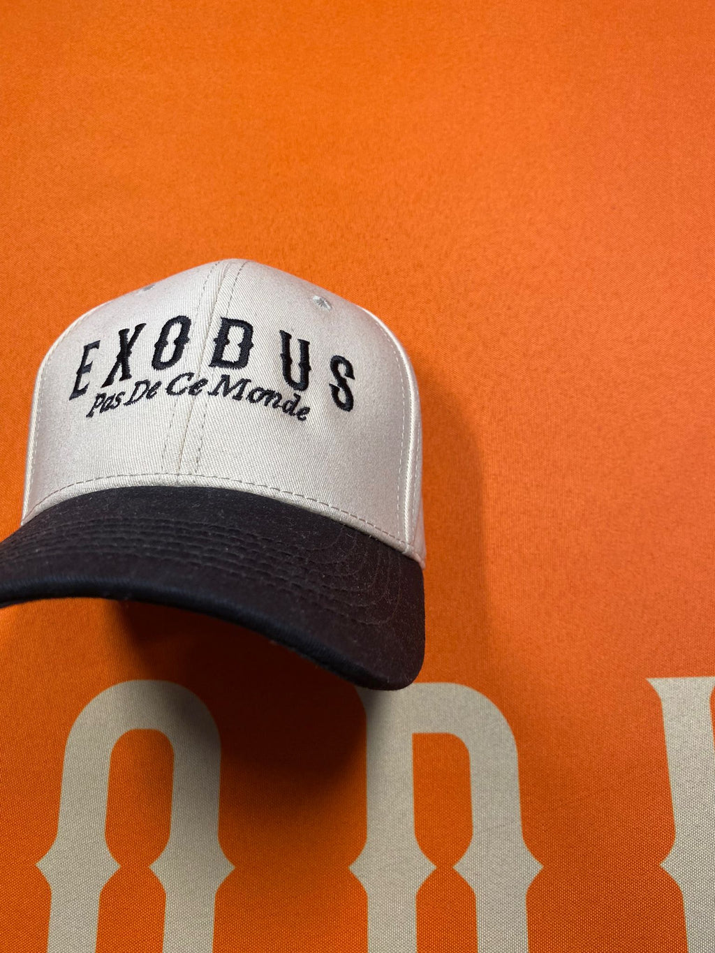 Clothing and accessories from Exodus Pas De Ce Monde – unisex streetwear including t-shirts, jackets, sunglasses, jewelry, bags, and headwear designed for everyday wear and bold urban fashion.
