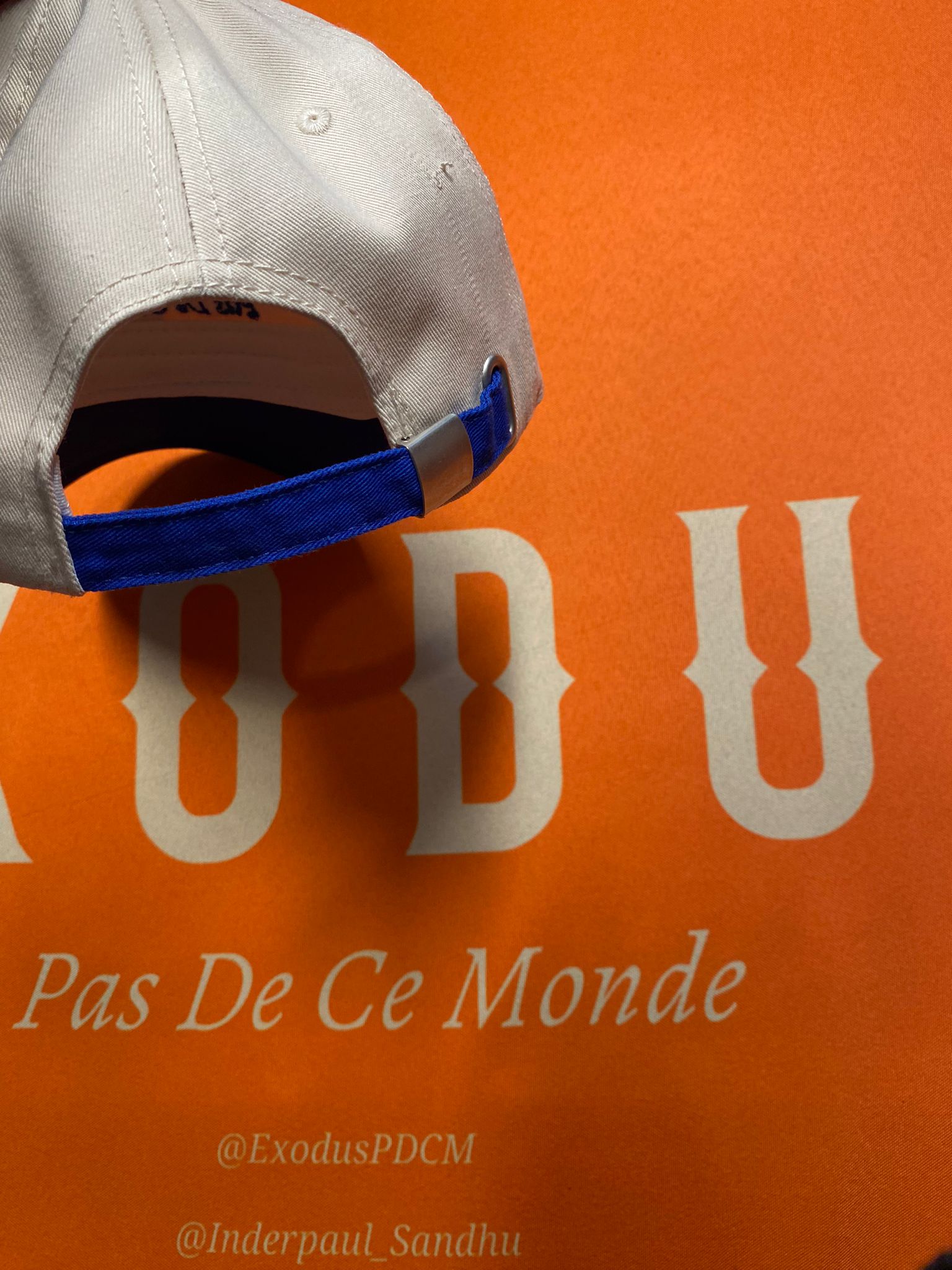 Clothing and accessories from Exodus Pas De Ce Monde – unisex streetwear including t-shirts, jackets, sunglasses, jewelry, bags, and headwear designed for everyday wear and bold urban fashion.