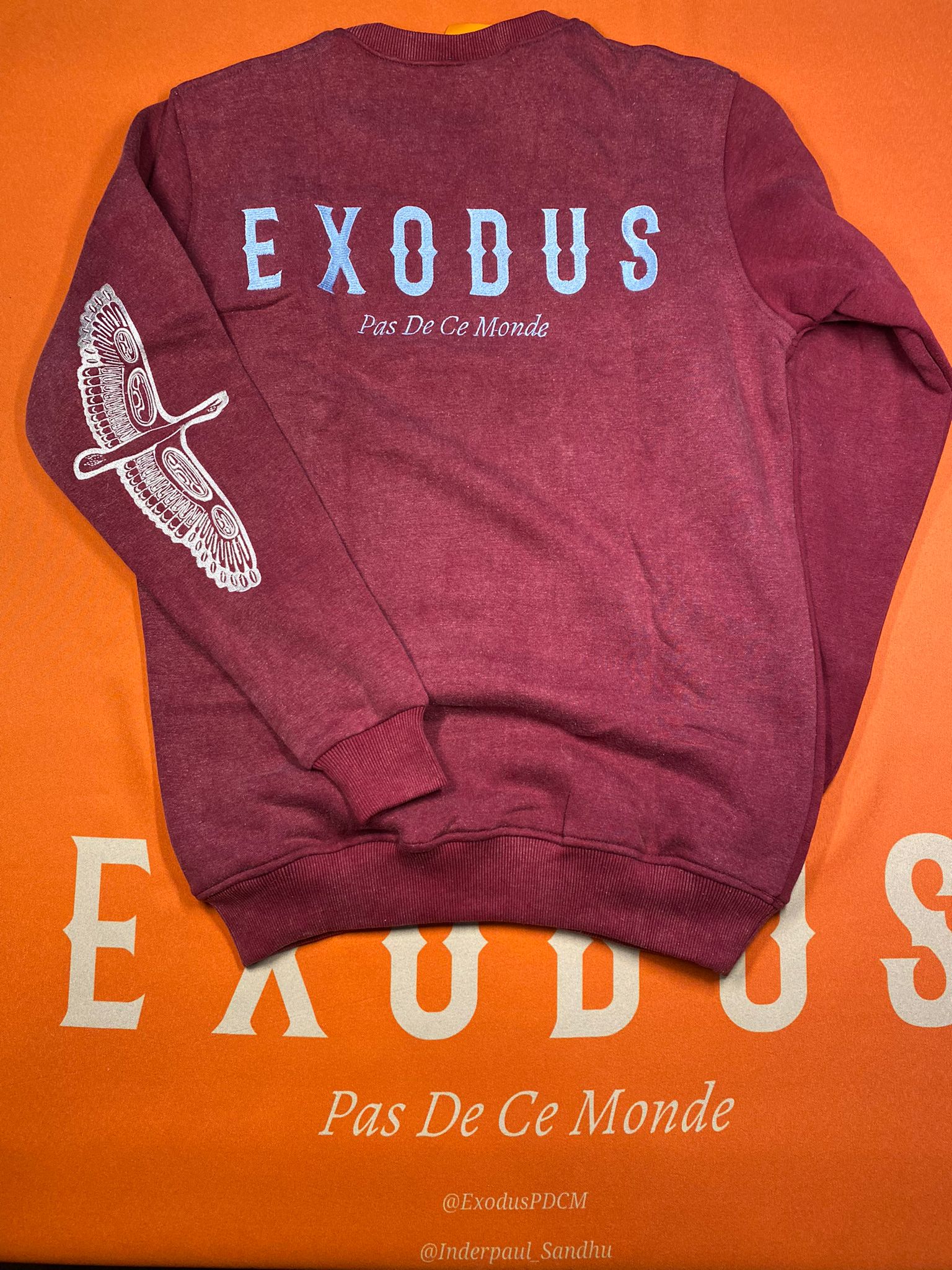 Clothing and accessories from Exodus Pas De Ce Monde – unisex streetwear including t-shirts, jackets, sunglasses, jewelry, bags, and headwear designed for everyday wear and bold urban fashion.