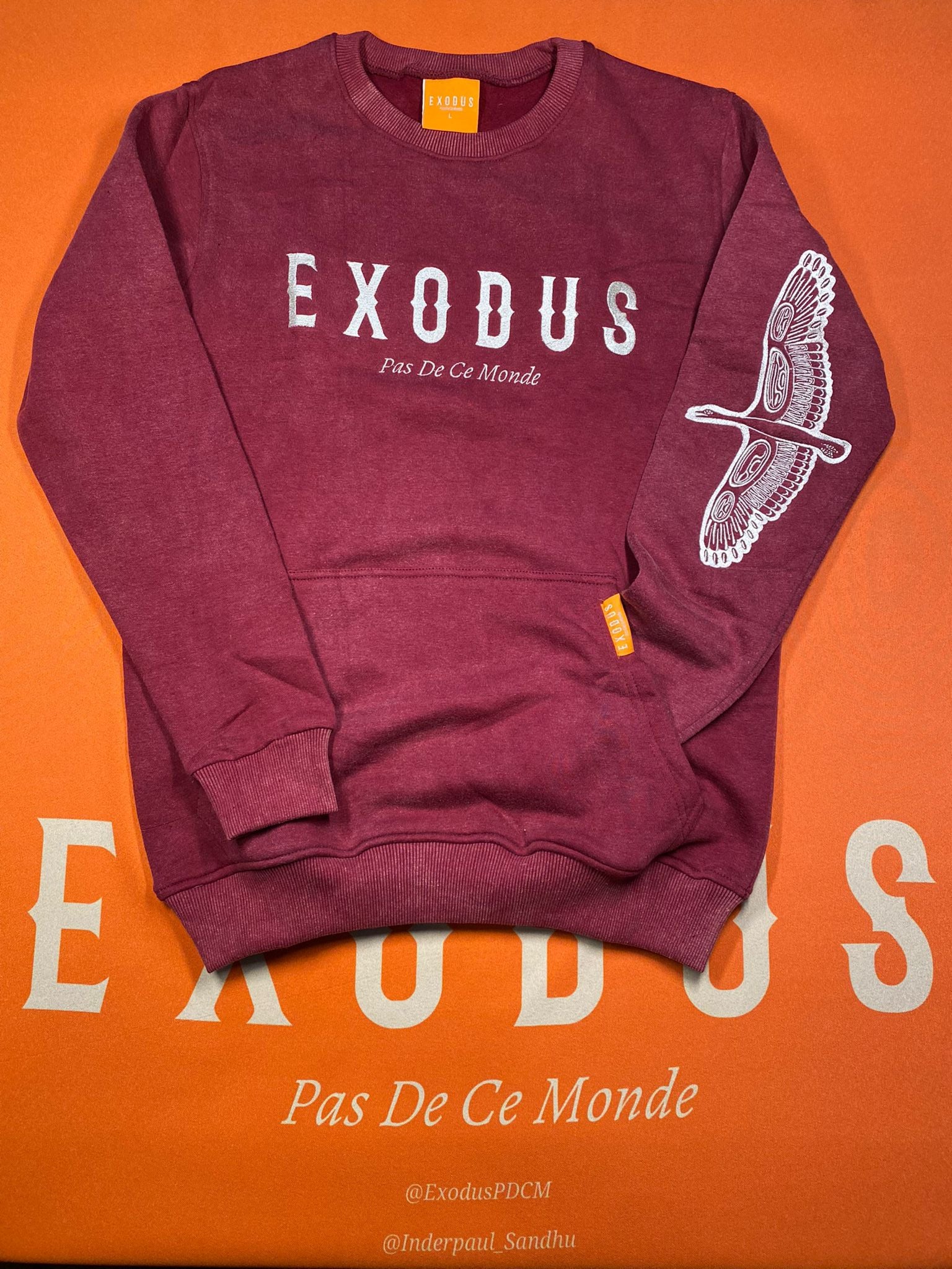 Clothing and accessories from Exodus Pas De Ce Monde – unisex streetwear including t-shirts, jackets, sunglasses, jewelry, bags, and headwear designed for everyday wear and bold urban fashion.